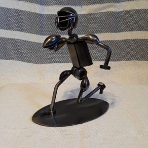 Scrap metal figurine football player